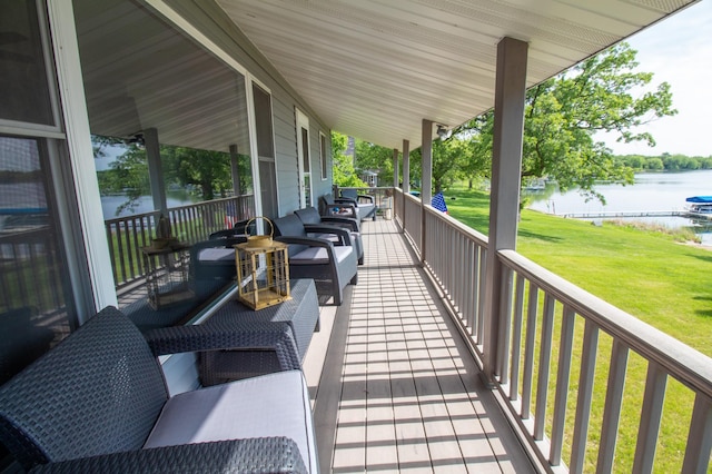 27668 Crappie Trl, Sverdrup Twp, MN 56586 - porch featuring a water view, a yard, and outdoor lounge area