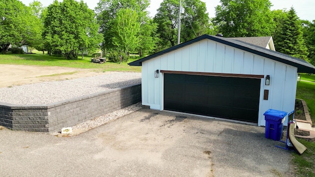 27668 Crappie Trl, Sverdrup Twp, MN 56586 - detached garage featuring view of scattered trees