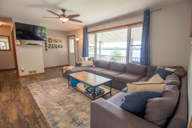 27668 Crappie Trl, Sverdrup Twp, MN 56586 - living room with ceiling fan, wood finished floors, and baseboards