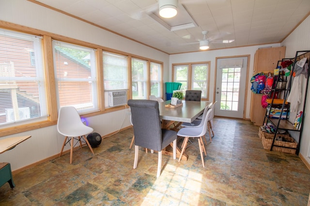 27668 Crappie Trl, Sverdrup Twp, MN 56586 - dining area with ornamental molding, plenty of natural light, baseboards, wood walls, and cooling unit
