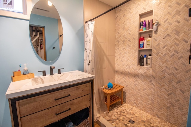27668 Crappie Trl, Sverdrup Twp, MN 56586 - full bathroom featuring vanity and a tile shower