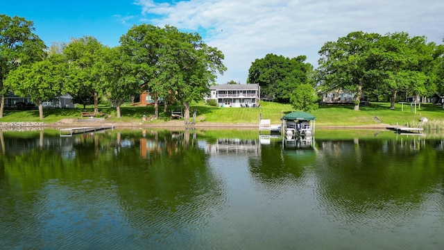 27668 Crappie Trl, Sverdrup Twp, MN 56586 - water view featuring a boat dock and boat lift