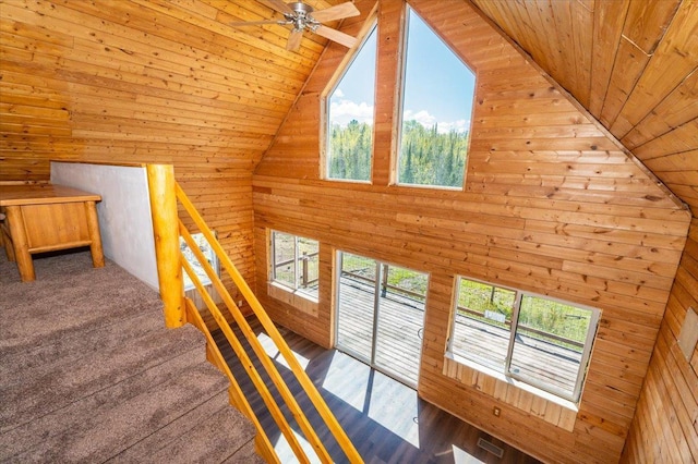 2331 Wilderness Rd, Lakeside Twp, WI 54864 - staircase featuring wood walls, wood ceiling, healthy amount of natural light, ceiling fan, and high vaulted ceiling