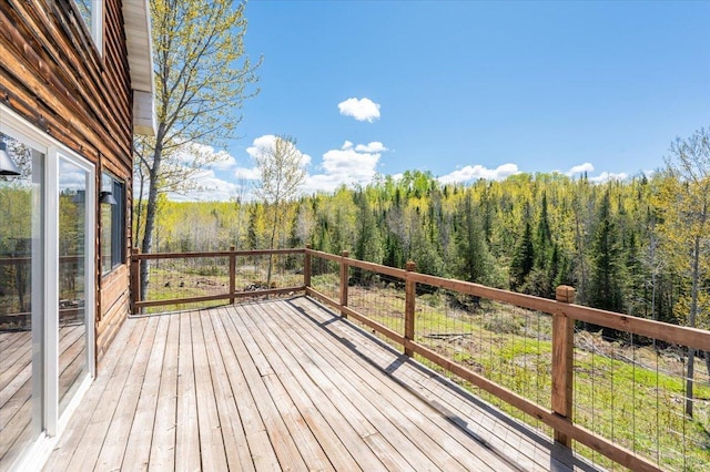 2331 Wilderness Rd, Lakeside Twp, WI 54864 - wooden terrace with a view of trees