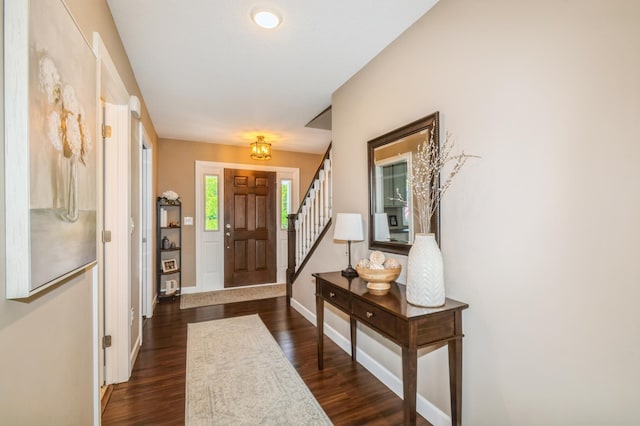13284 288th Ave NW, Zimmerman, MN 55398 - entrance foyer with baseboards, stairway, and dark wood finished floors