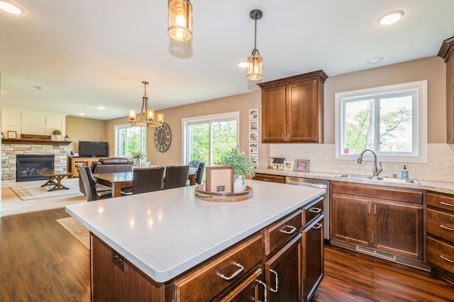 13284 288th Ave NW, Zimmerman, MN 55398 - kitchen with a sink, dark wood-style flooring, healthy amount of natural light, decorative backsplash, and recessed lighting