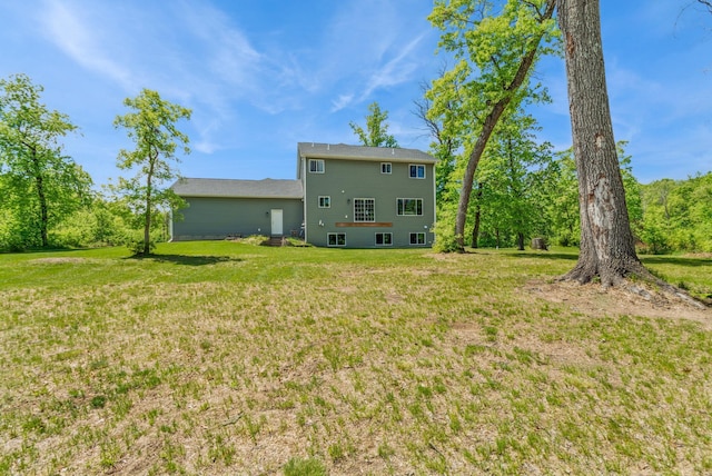 13284 288th Ave NW, Zimmerman, MN 55398 - back of house with a lawn