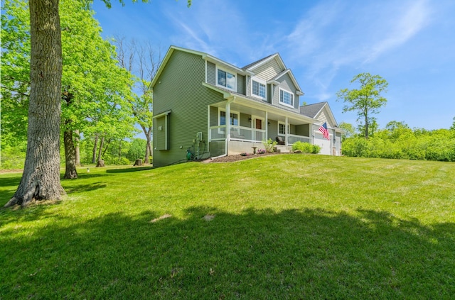 13284 288th Ave NW, Zimmerman, MN 55398 - view of front of property with a porch and a front lawn