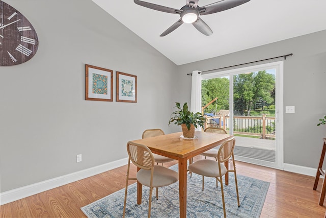 1112 Dakota St S, Shakopee, MN 55379 - dining area featuring vaulted ceiling, baseboards, light wood-style floors, and ceiling fan