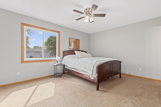 1112 Dakota St S, Shakopee, MN 55379 - carpeted bedroom featuring baseboards and a ceiling fan