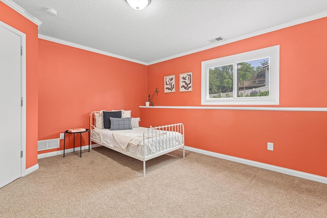 1112 Dakota St S, Shakopee, MN 55379 - bedroom featuring crown molding, carpet floors, a textured ceiling, and baseboards