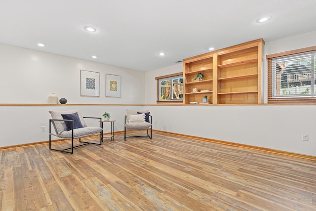 1112 Dakota St S, Shakopee, MN 55379 - sitting room featuring light wood-style floors, recessed lighting, and baseboards