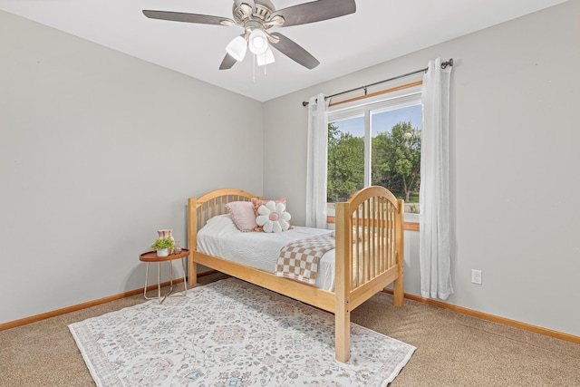 1112 Dakota St S, Shakopee, MN 55379 - bedroom with carpet floors, baseboards, and a ceiling fan