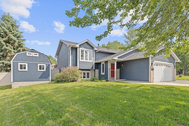 1112 Dakota St S, Shakopee, MN 55379 - view of front of home with a garage, concrete driveway, brick siding, and a storage unit