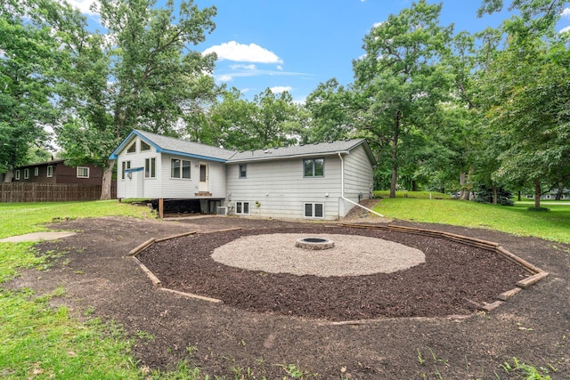 16724 Kenyon Cir NE, Ham Lake, MN 55304 - back of property with an outdoor fire pit