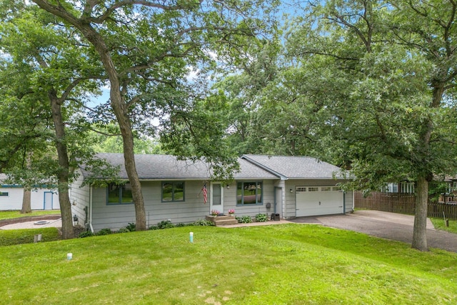 16724 Kenyon Cir NE, Ham Lake, MN 55304 - view of front of house with asphalt driveway, an attached garage, and roof with shingles