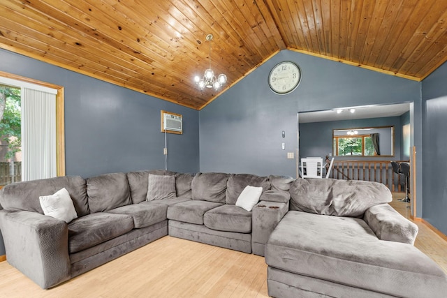 16724 Kenyon Cir NE, Ham Lake, MN 55304 - living area with wood finished floors, vaulted ceiling, a wall mounted air conditioner, a chandelier, and healthy amount of natural light