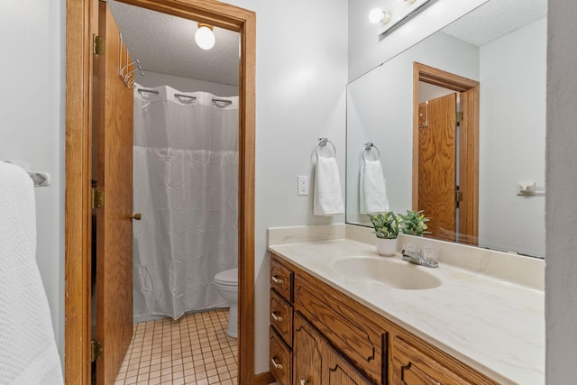 16724 Kenyon Cir NE, Ham Lake, MN 55304 - full bath with a textured ceiling, vanity, and tile patterned flooring