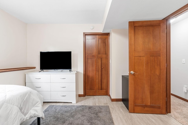 16724 Kenyon Cir NE, Ham Lake, MN 55304 - bedroom featuring baseboards and light wood-type flooring
