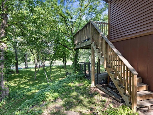 24810 96th St NW, Zimmerman, MN 55398 - view of grassy yard with stairs and a deck