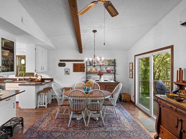 24810 96th St NW, Zimmerman, MN 55398 - dining area with dark wood finished floors, ceiling fan, a textured ceiling, a wall mounted AC, and a chandelier