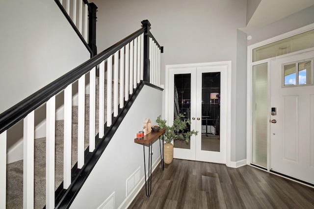 19281 Blue Stem Ct, Maple Grove, MN 55311 - entryway with french doors, wood finished floors, baseboards, and stairway