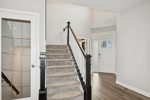 19281 Blue Stem Ct, Maple Grove, MN 55311 - stairway with wood finished floors and baseboards