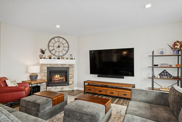 19281 Blue Stem Ct, Maple Grove, MN 55311 - living area with wood finished floors, a fireplace, and recessed lighting