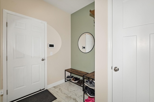 19281 Blue Stem Ct, Maple Grove, MN 55311 - mudroom featuring light marble finish flooring and baseboards