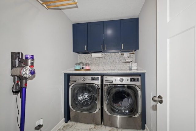 19281 Blue Stem Ct, Maple Grove, MN 55311 - laundry room featuring cabinet space, independent washer and dryer, light marble finish flooring, a dry bar, and baseboards