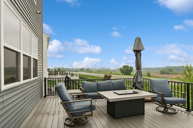 19281 Blue Stem Ct, Maple Grove, MN 55311 - wooden deck featuring a view of rural / pastoral area and an outdoor living space with a fire pit