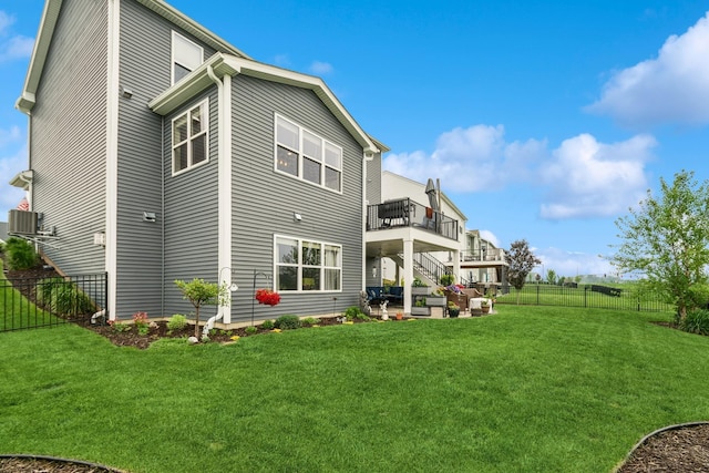 19281 Blue Stem Ct, Maple Grove, MN 55311 - rear view of house with a patio and central air condition unit