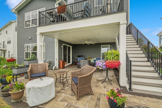 19281 Blue Stem Ct, Maple Grove, MN 55311 - view of patio / terrace with stairway, a balcony, ceiling fan, and outdoor dining space
