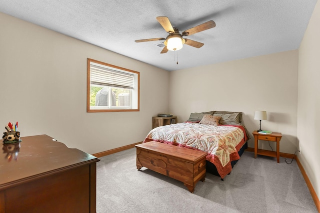 2708 94th Ave N, Brooklyn Park, MN 55444 - bedroom with carpet, baseboards, a textured ceiling, and a ceiling fan