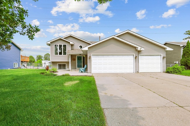 2708 94th Ave N, Brooklyn Park, MN 55444 - tri-level home with concrete driveway and an attached garage