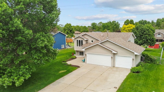 2708 94th Ave N, Brooklyn Park, MN 55444 - view of front of home with concrete driveway, an attached garage, roof with shingles, and a front yard