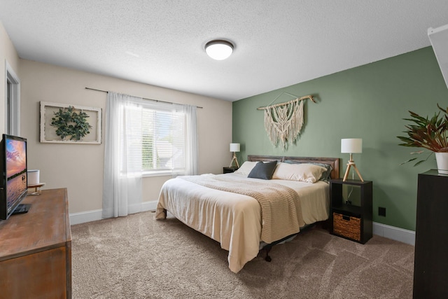 2708 94th Ave N, Brooklyn Park, MN 55444 - bedroom featuring carpet flooring, baseboards, and a textured ceiling