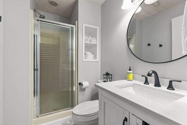 2708 94th Ave N, Brooklyn Park, MN 55444 - full bath with toilet, a shower stall, vanity, and a textured ceiling