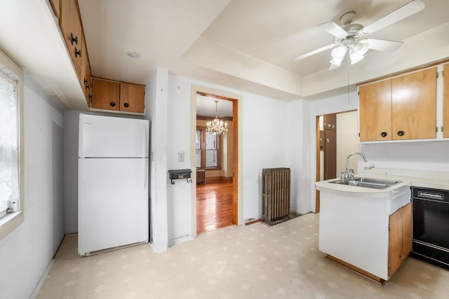 1027 Van Slyke Ave, Saint Paul, MN 55103 - kitchen featuring freestanding refrigerator, radiator heating unit, dishwasher, a sink, and ceiling fan