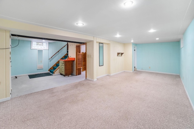 1027 Van Slyke Ave, Saint Paul, MN 55103 - below grade area with carpet, stairs, baseboards, and recessed lighting