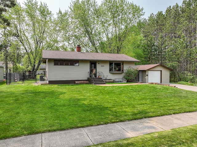 1424 Summit Ave, Cloquet, MN 55720 - view of front of property featuring an outdoor structure, driveway, and a chimney