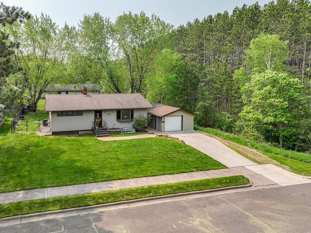 1424 Summit Ave, Cloquet, MN 55720 - ranch-style home featuring an outdoor structure, a garage, driveway, a front yard, and a chimney