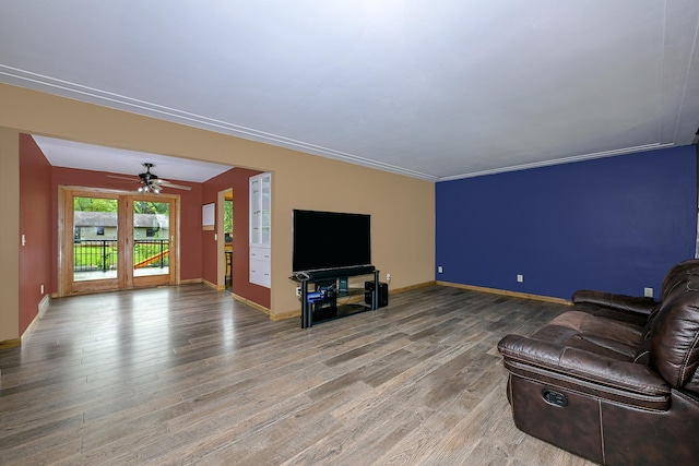 1424 Summit Ave, Cloquet, MN 55720 - unfurnished living room with wood finished floors, baseboards, and a ceiling fan