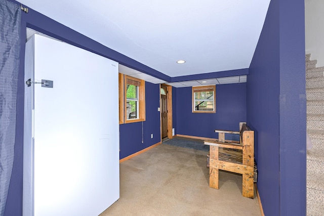 1424 Summit Ave, Cloquet, MN 55720 - unfurnished room featuring stairs, carpet floors, baseboards, and recessed lighting