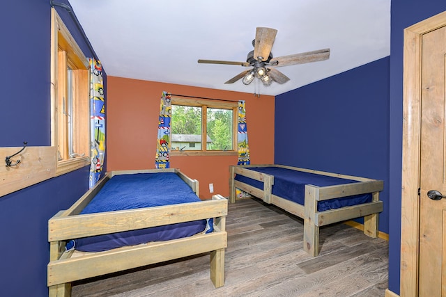1424 Summit Ave, Cloquet, MN 55720 - bedroom featuring wood finished floors and baseboards