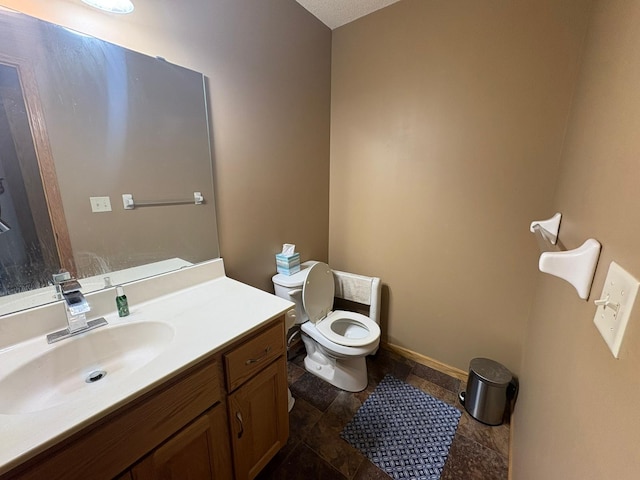 5460 100th Ln N, Brooklyn Park, MN 55443 - half bath featuring toilet, vanity, baseboards, and stone finish floors