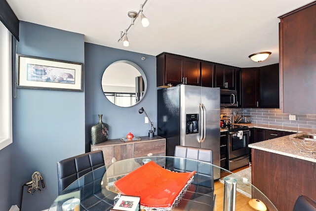 433 7th St Unit 1623, Minneapolis, MN 55415 - kitchen featuring stainless steel appliances, light stone countertops, backsplash, light wood finished floors, and dark brown cabinetry
