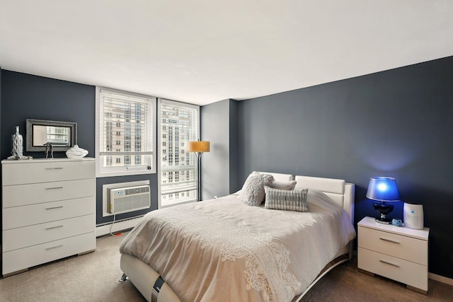 433 7th St Unit 1623, Minneapolis, MN 55415 - carpeted bedroom with a baseboard heating unit, a wall mounted air conditioner, and baseboards