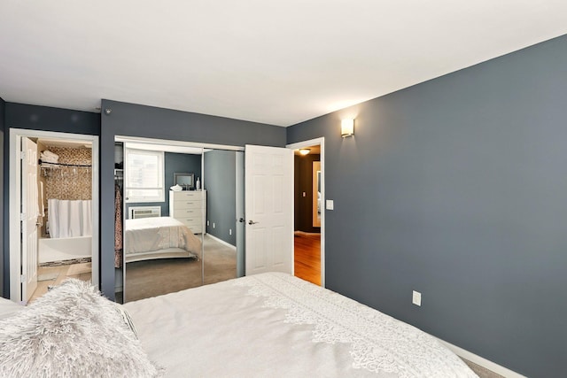 433 7th St Unit 1623, Minneapolis, MN 55415 - carpeted bedroom with a closet and baseboards