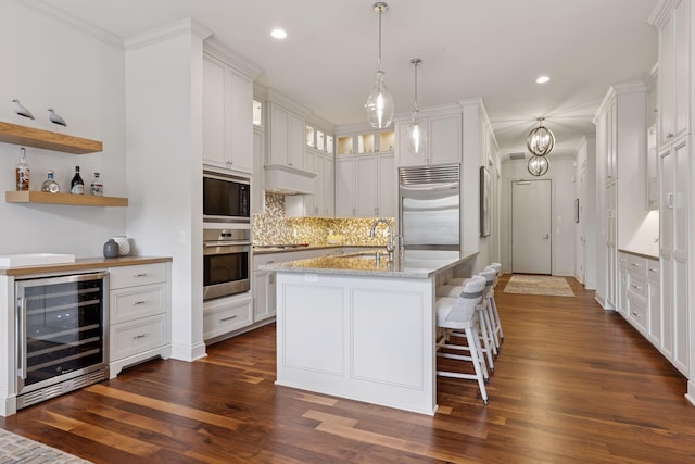 935 Lake St E Unit 211, Wayzata, MN 55391 - kitchen featuring built in appliances, beverage cooler, dark wood-style floors, recessed lighting, and tasteful backsplash